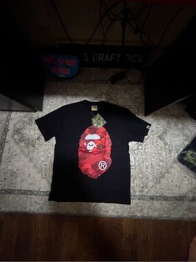 Bape Black Tee with Red Camo Ape Head Graphic